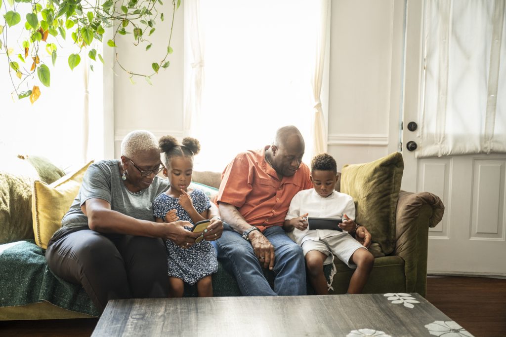 silver surfers and digital natives enjoying their technology